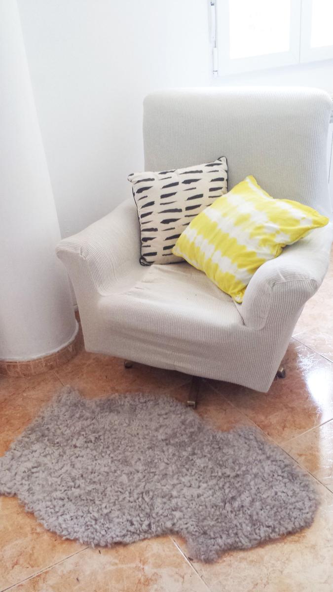 Decorar con telas - Sillón con funda marfil