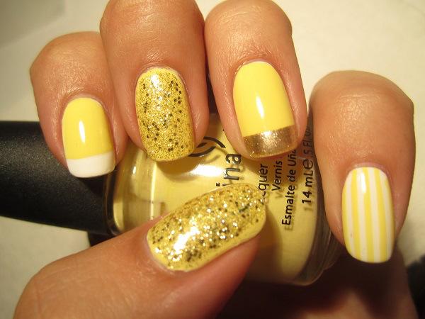 uñas decoradas de amarillo
