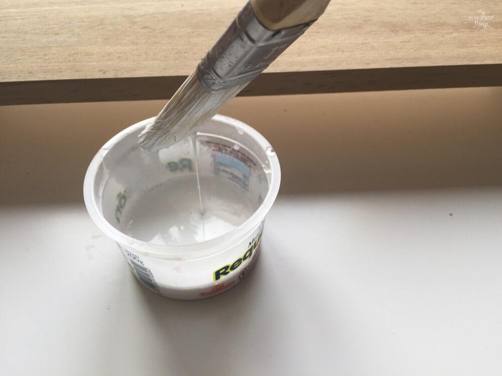 If you wonder how to weather wood yourself the easy way you cant miss this post. Take some paint, a container and a rag and enjoy the process.