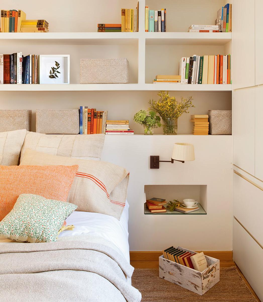 Detalle de cabecero de obra con mesillas incorporadas