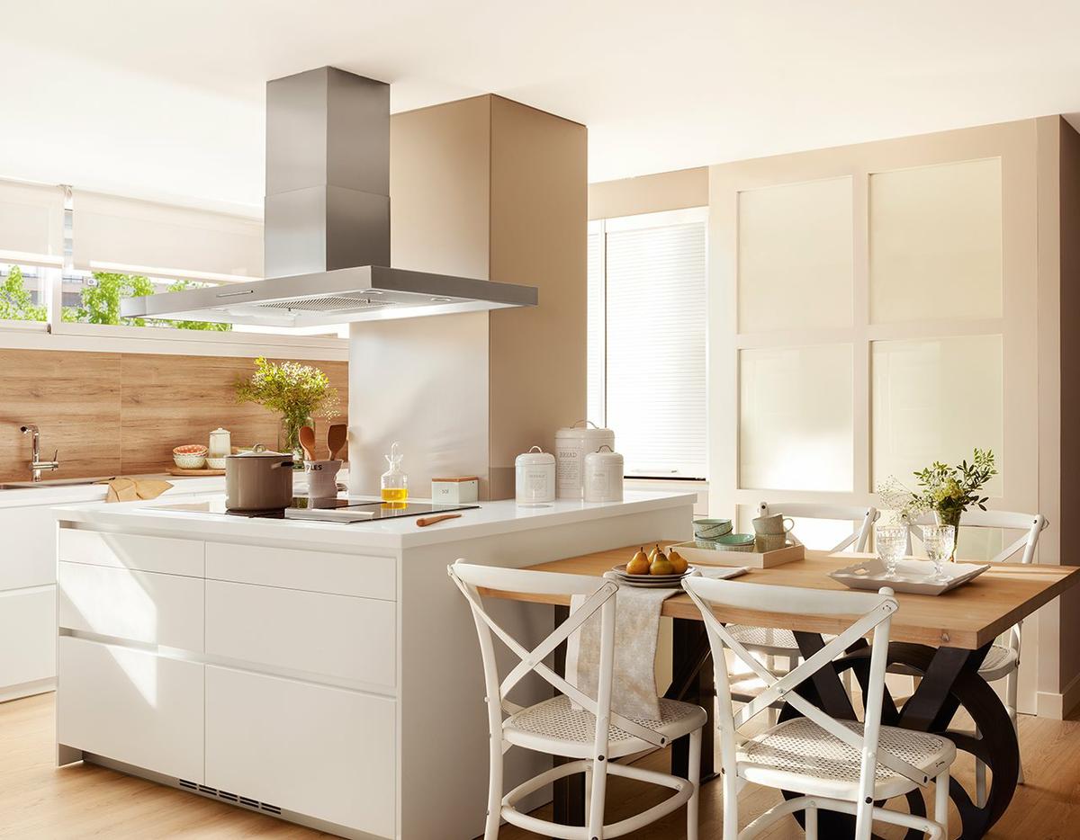 cocina_con_campana_exenta_y_mesa_como_prolongacion_de_la_isla_1280x997
