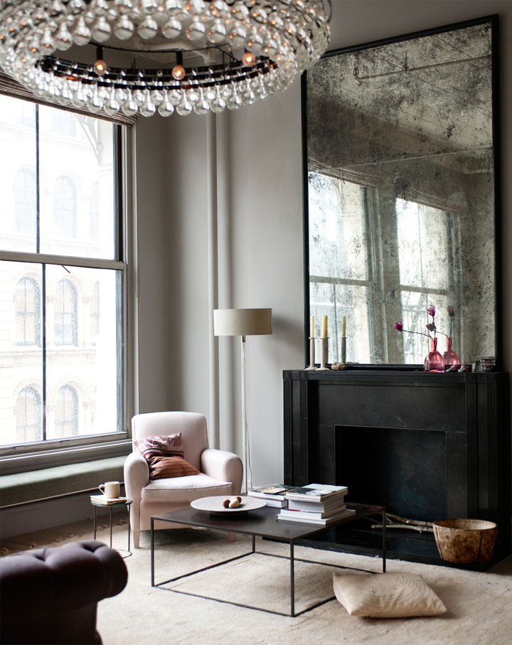 Living area of Soho loft. Mirror and pendant are from Ochre