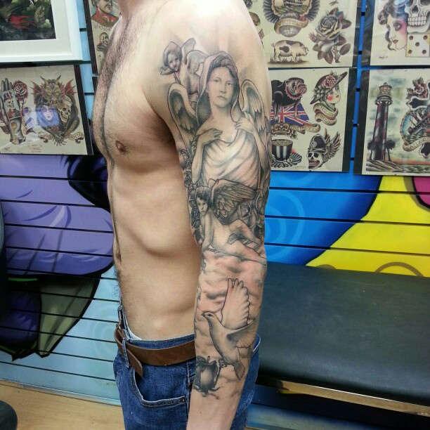 Tatuaje de paloma y angel