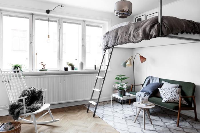 Dormitorio multiusos con camas abatibles y estilo nórdico