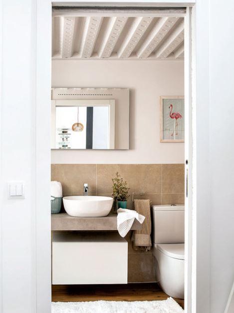 Vivir_con_mucho_estilo_en_45m2_baño_tonalidades_tierra_galeria_portrait