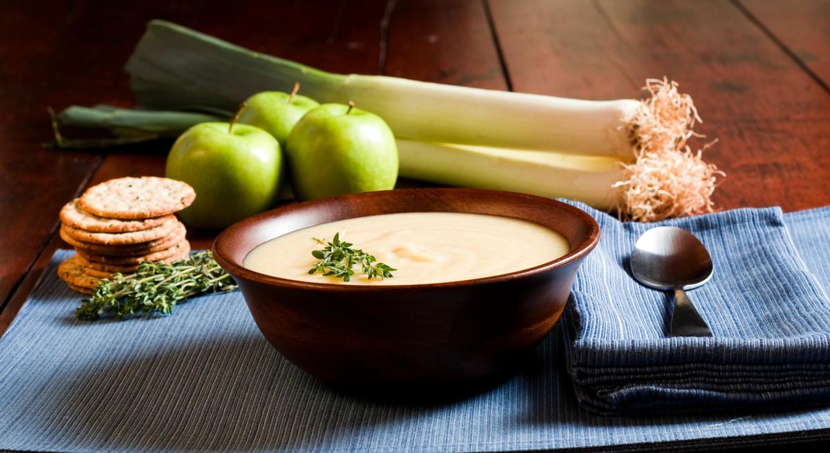 2555401 - apple and leek soup on a rustic table