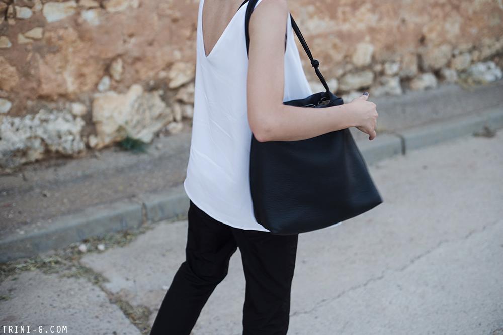 Trini | Stella McCartney top Prada trousers