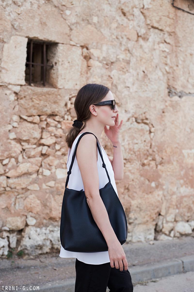 Trini | Stella McCartney top Prada trousers