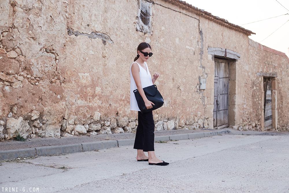 Trini | Stella McCartney top Prada trousers