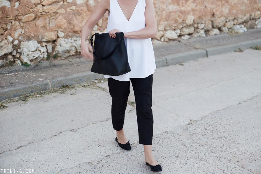 Trini | Stella McCartney top Prada trousers