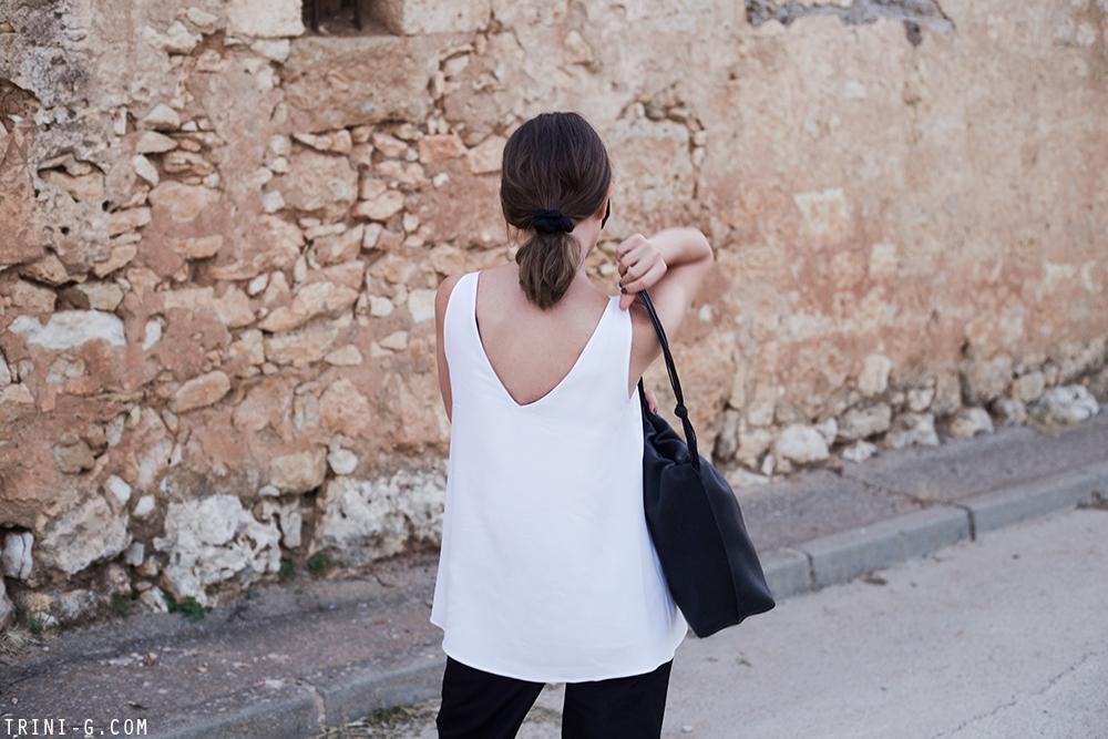 Trini | Stella McCartney top Prada trousers