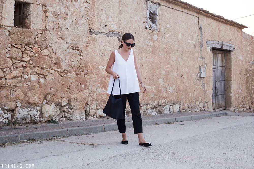 Trini | Stella McCartney top Prada trousers