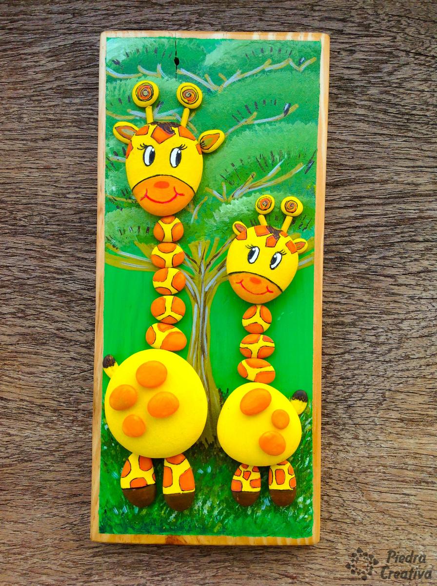 Jirafas pintadas en piedras