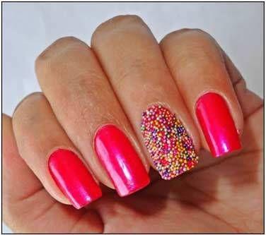 Uñas rojas con caviar