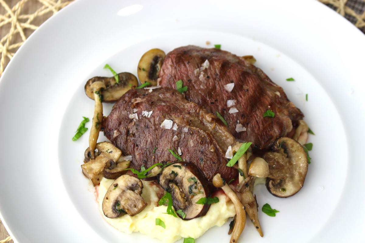 Presa ibérica con parmentier de patatas y setas