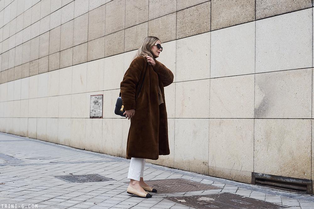 Trini | Toteme Chelsea faux fur coat Chanel flats
