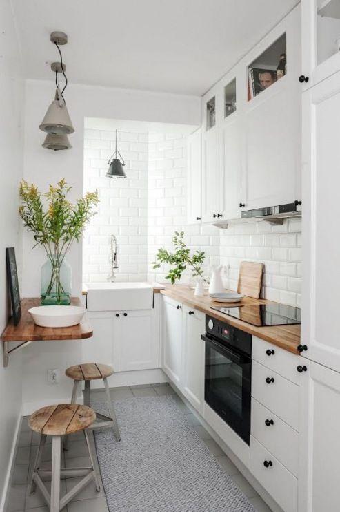 decoración nórdica con plantas en la cocina