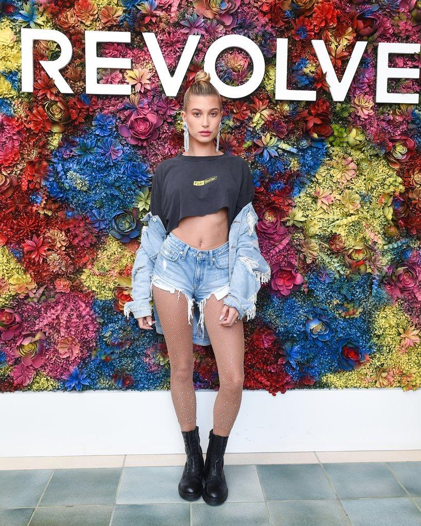 Hailey-Baldwin-wearing-slashed-tee-glitter-tights-denim
