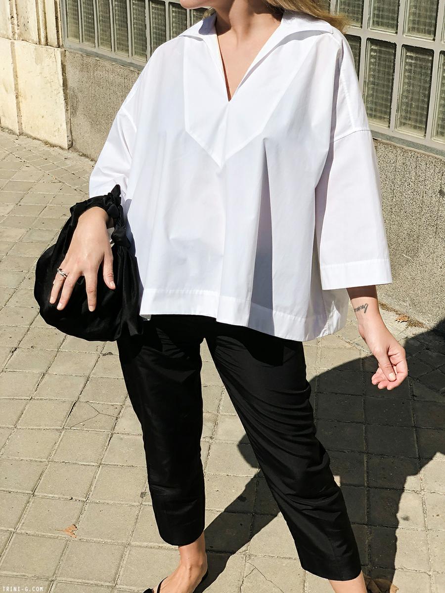 Trini | Balenciaga top Prada trousers