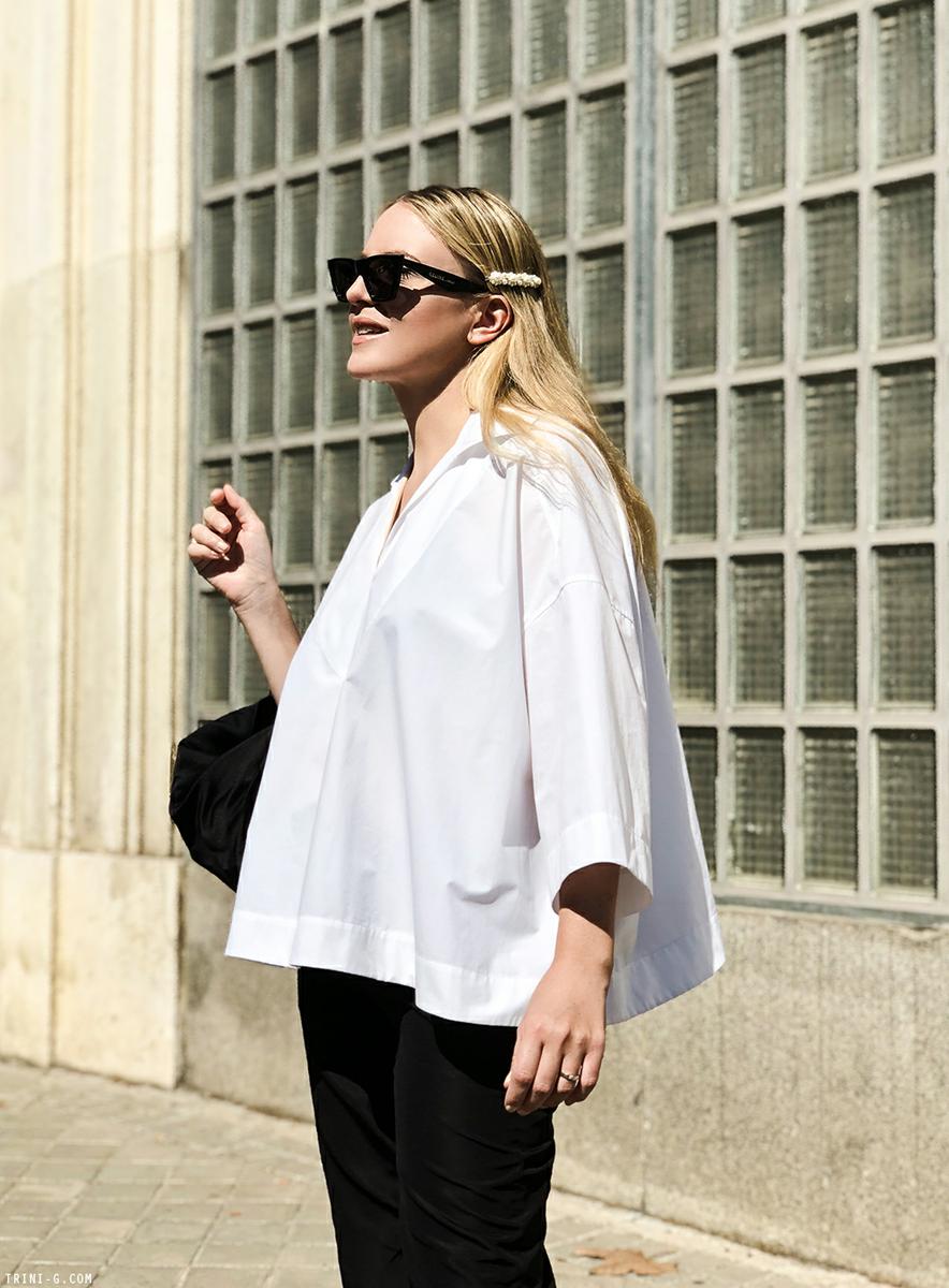Trini | Balenciaga top Prada trousers
