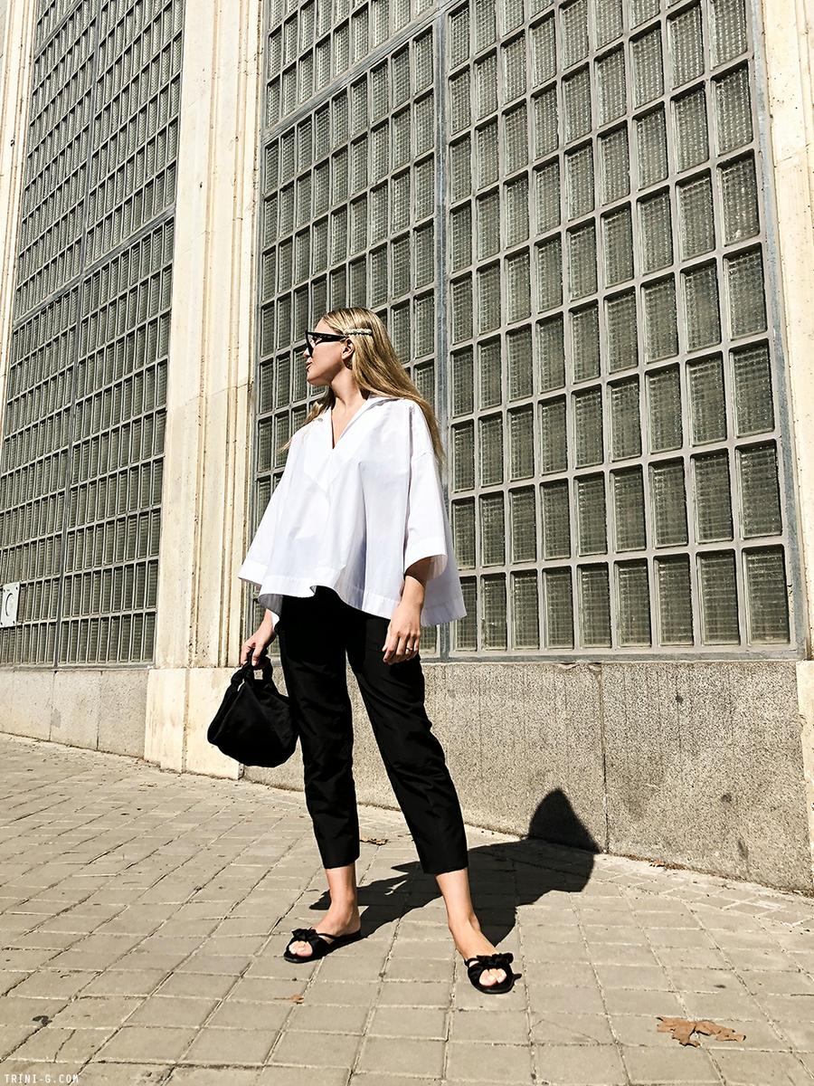 Trini | Balenciaga top Prada trousers