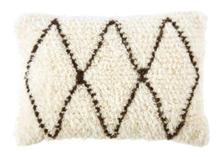 cojín bereber para dormitorio rosa con texturas