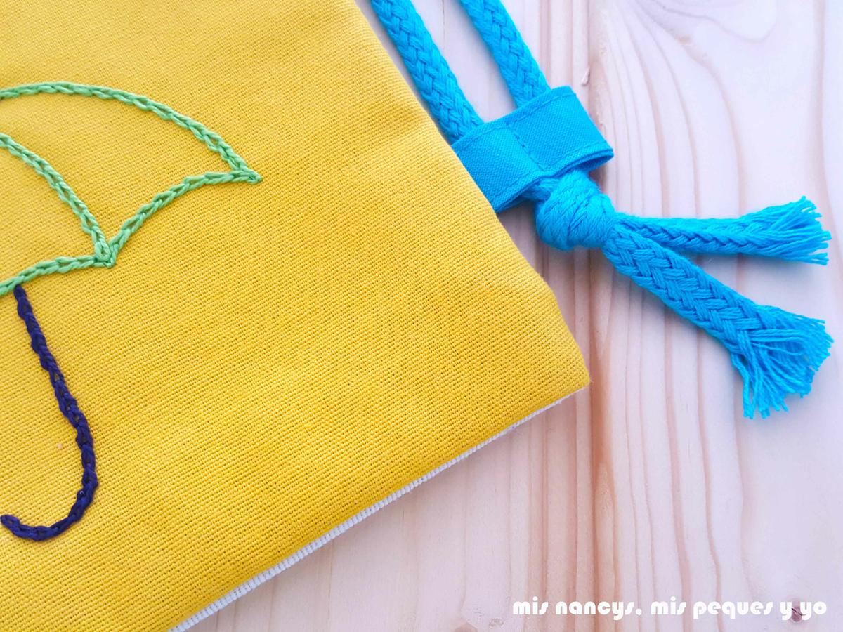 mis nancys, mis peques y yo, mochilas de tela infantiles, detalle pasador de cordones