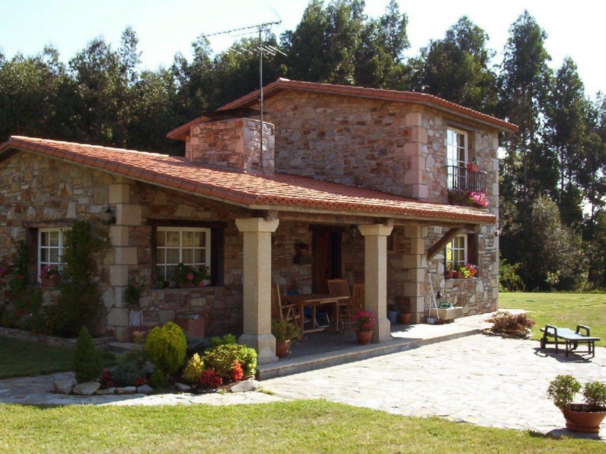 Diseños de casas rusticas de dos pisos con porches