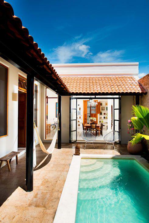 Diferentes estilos de piscina para casas de campo