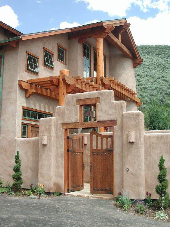 Diseños de casas de dos pisos construidas de adobe
