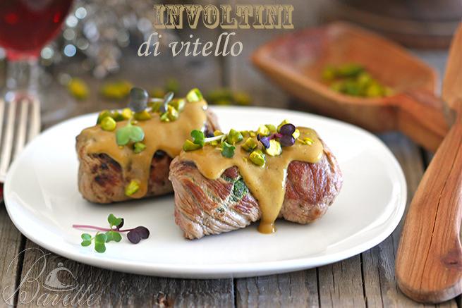 Invotini di vitello con espinacas, frutos secos y salsa de mostaza a la miel.