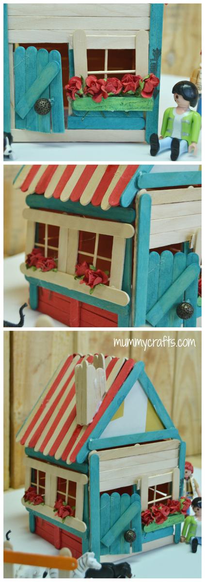 Detalle de una casa hecha con palos de helados