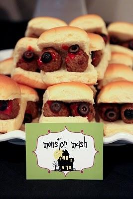 Food for Halloween party. Meat ball marinara sandwich with olive eye, in Hawaiian roll or slider bun.