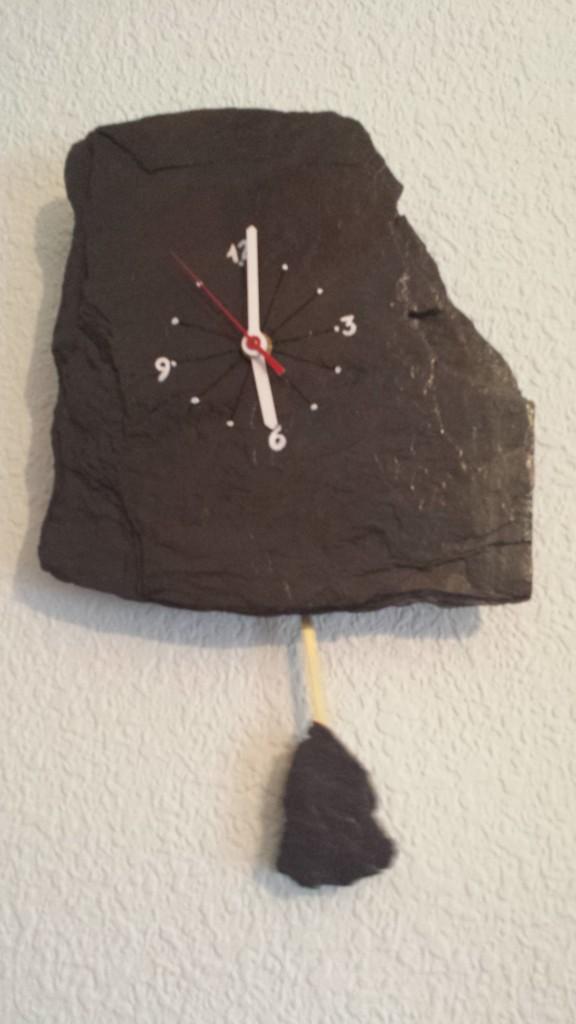 Reloj de pizarra con pendulo