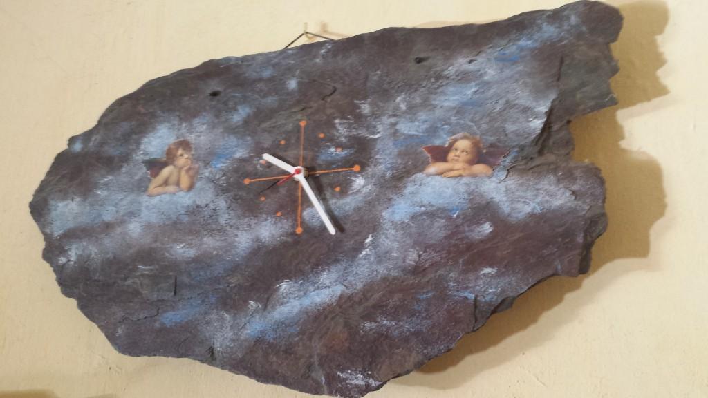 Reloj de pizarra con los angelotes de Rubens impresos