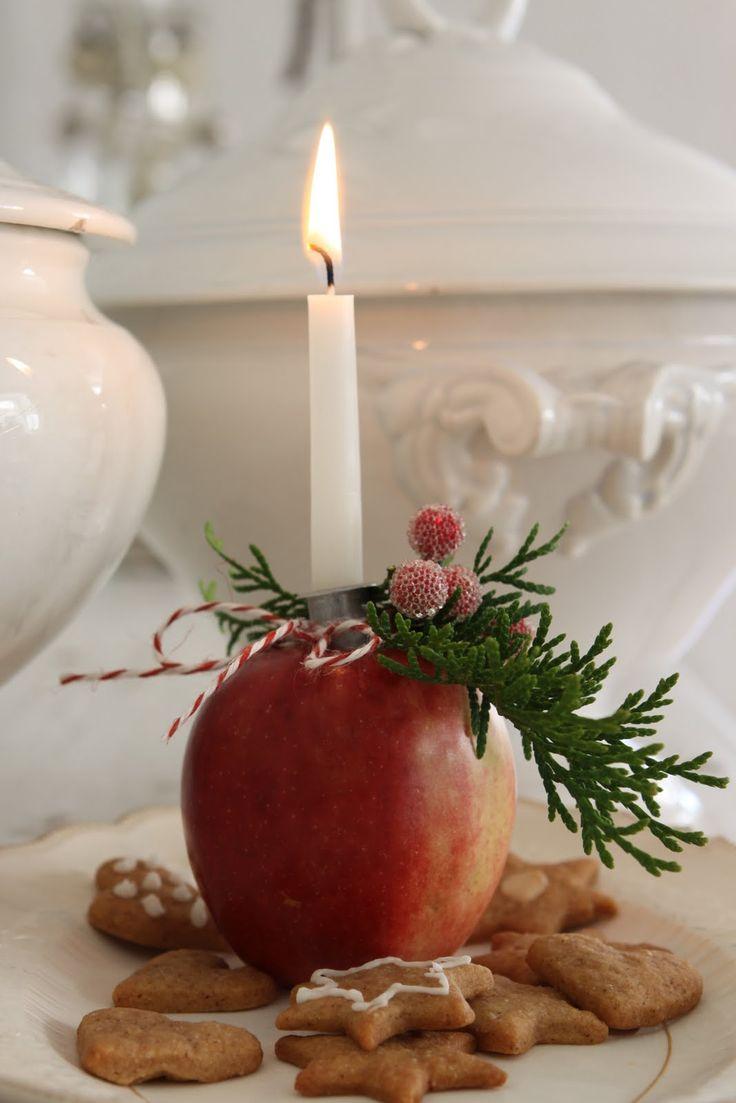 candelero con una manzana