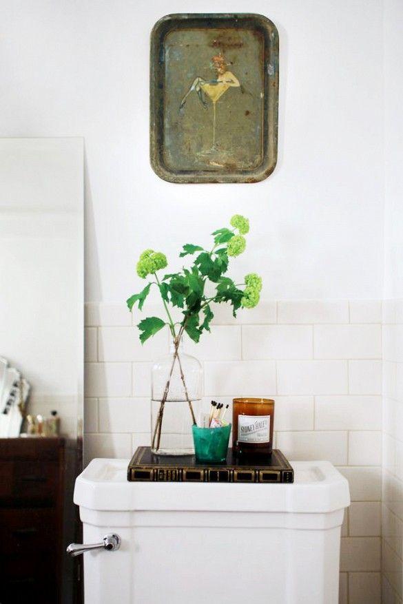 jarron sobre el inodoro