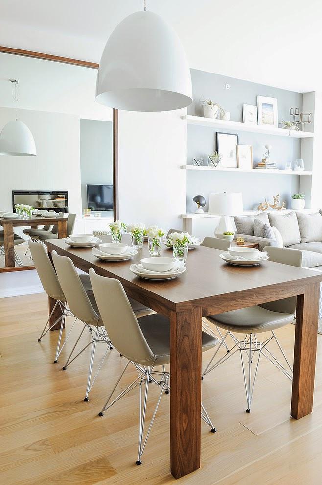 Un apartamento gris con detalles en madera