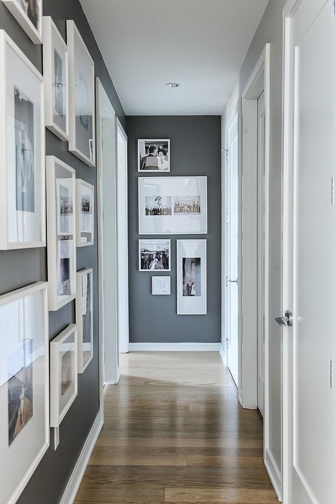 Un apartamento gris con detalles en madera