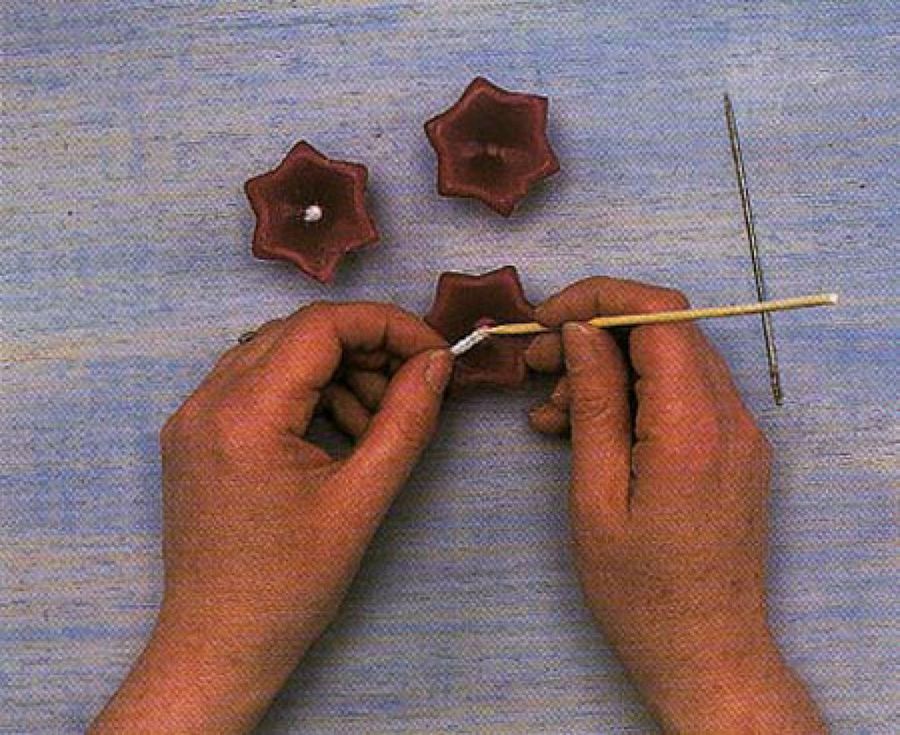 perforar el centro de la vela