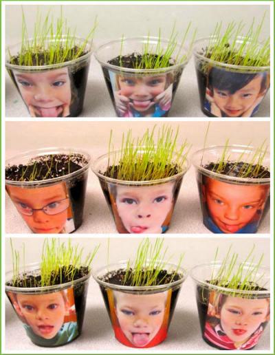 manualidad para niños de tiestos con su cara y pelo de hierba