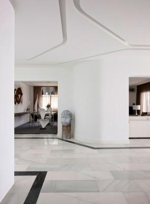 Artistic-Central-Side-Hallway-Design-Interior-with-Modern-Decoration-Used-White-Wall-and-Unique-Statue-Design-Ideas
