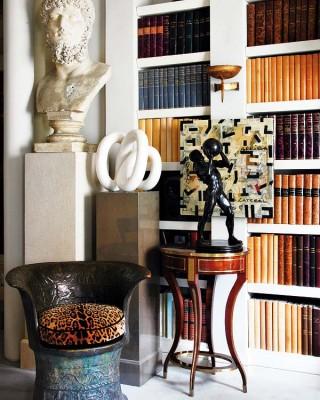 library-home-shelves-open-design-decor-art-sculpture-console-table-leopard-cushion-chair-decorating-ideas
