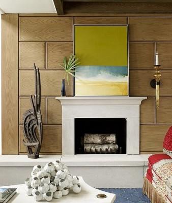 Lovely-artwork-combined-with-African-tribal-sculpture-elegantly-with-Modern-Minimalist-Fireplace-Decoration-Ideas