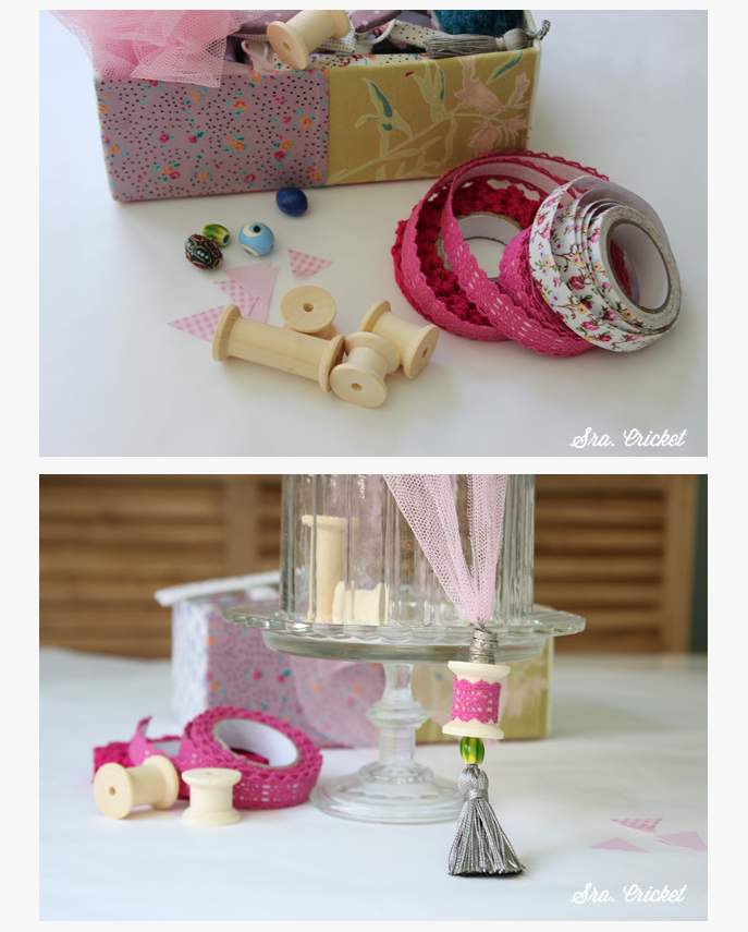 collar con carretes de hilo