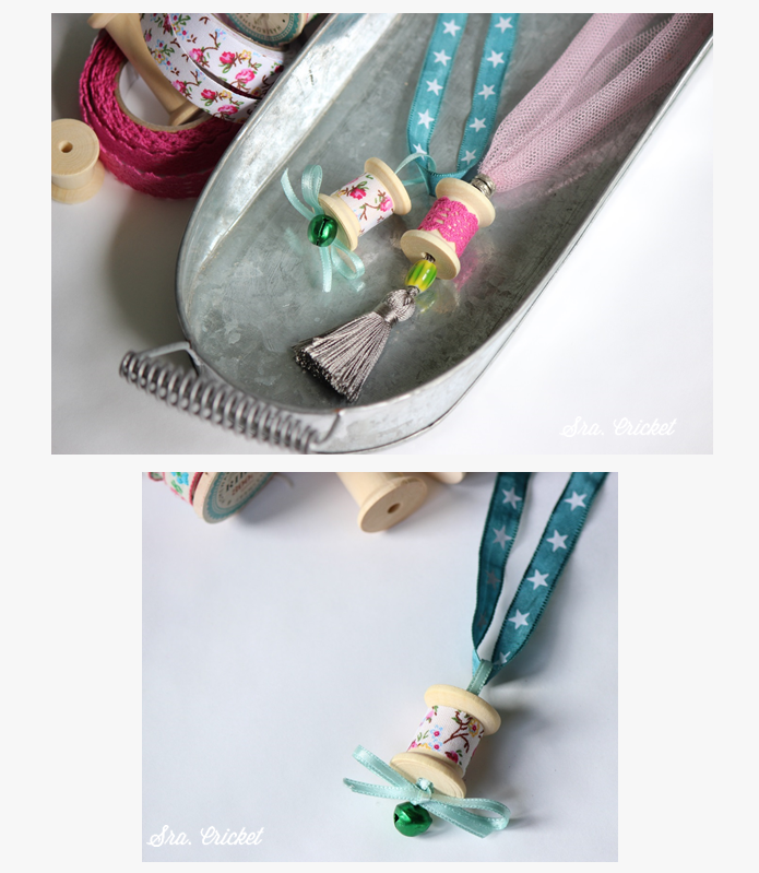 collar con carretes de hilo