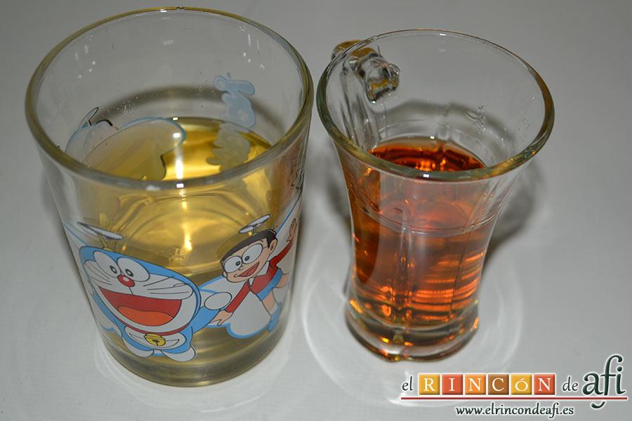 Chipirones afogaos, dejamos que rehogue unos minutos para añadirle el brandy y el vino blanco