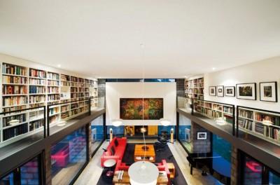 interior-ideas-modern-Adoring-double-height-room-with-library-mezzanine-and-big-abstract-painting-over-wood-burning-fireplace
