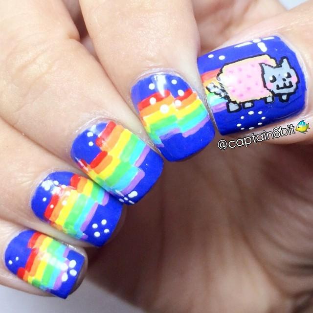 decorando uñas con gato cosmico