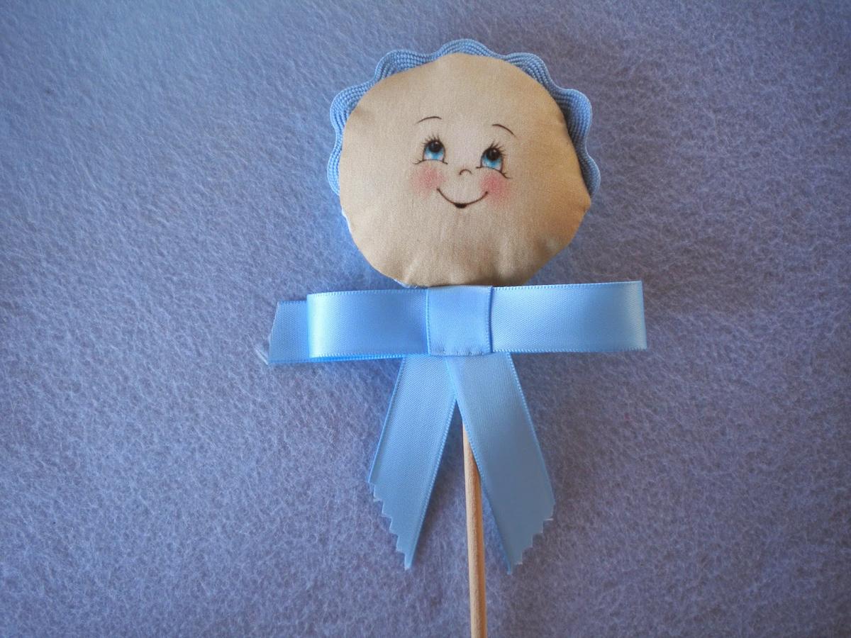 Manualidades Caseras Inma_ Recuerdos bautizo caras de niño azules con lazo